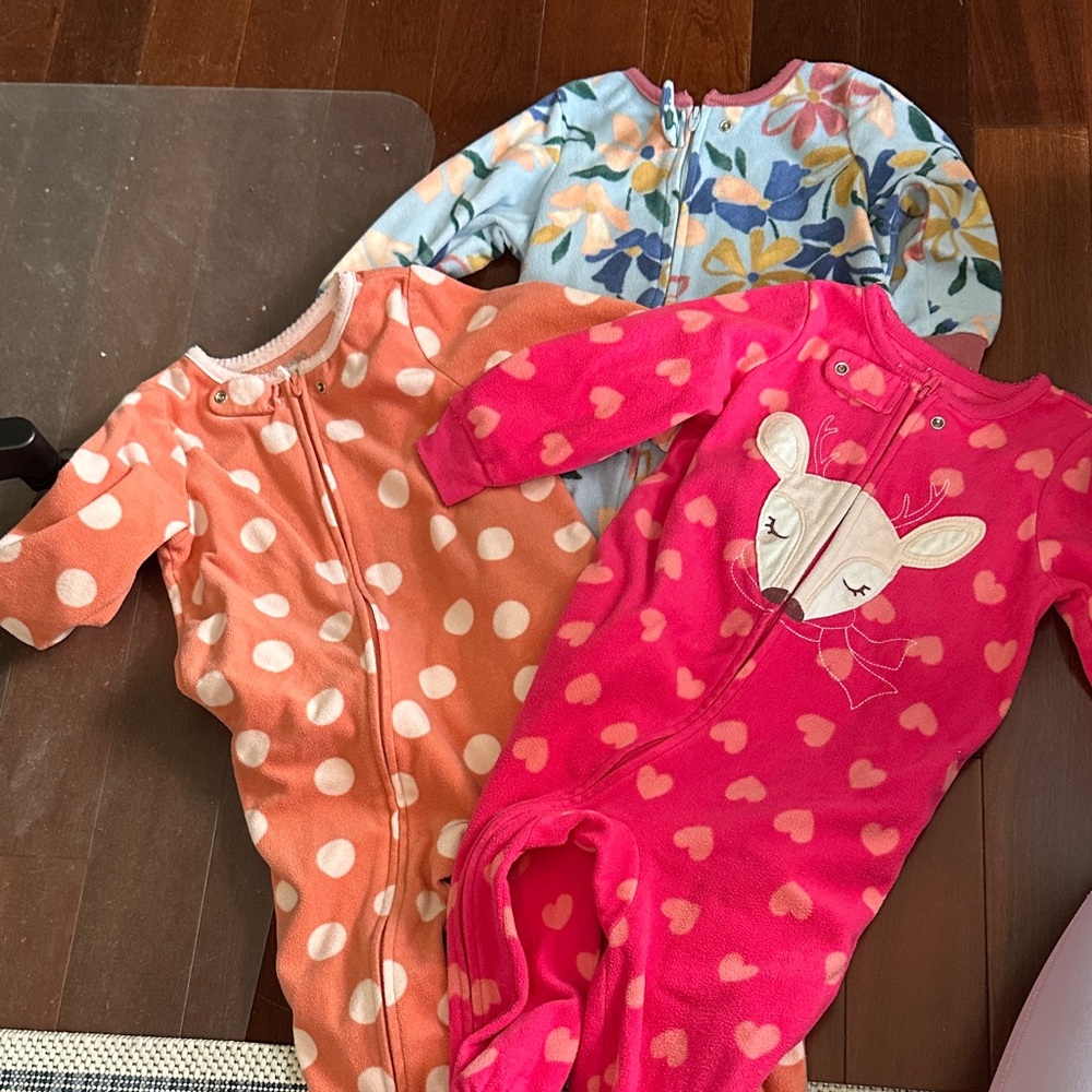 Three Carter's Cozy Baby Onesies